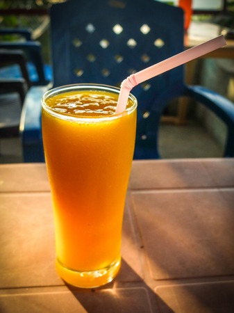 Cold juice served outside in an Indian beach cafe,wth crushed ice.の写真素材