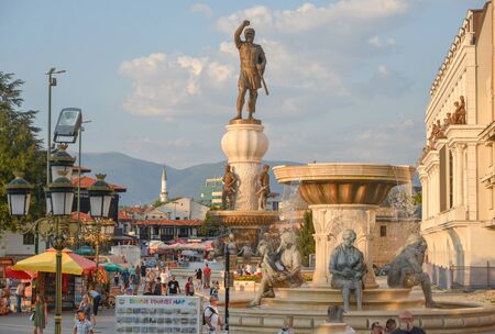 SKOPJE,NORTH MACEDONIA/AUGUST 22 2018: View from Stone Bridge,Skopje.Looking east towards Old Bazaar,fountains,mosque and statues.のeditorial素材