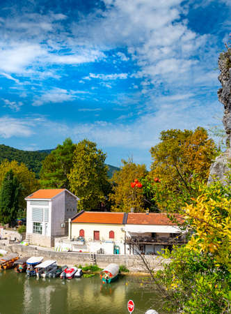 Beautiful scenic location for hiring boat excursions to see Skadar lake and dramatic mountain scenery surrounding it,viewed from beside the World War Two monument..のeditorial素材