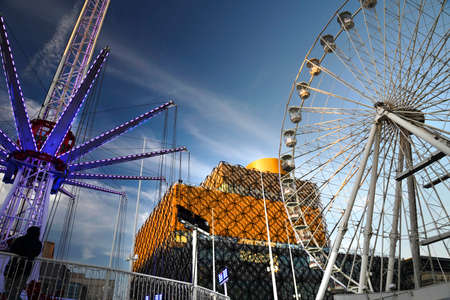 as Christmas approaches,people visit the modern Library roof for views and enjoy fairground rides...