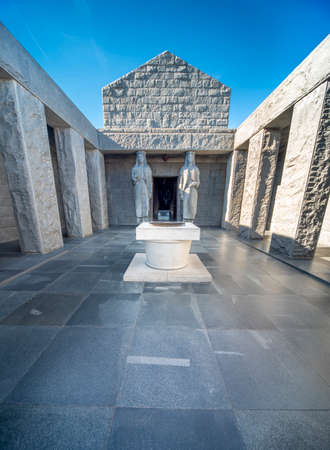 Marble tiled floor and two Caryatid statues of Montenegrins standing at the entrance to the small chamber,monument and remains of Njegos insideのeditorial素材