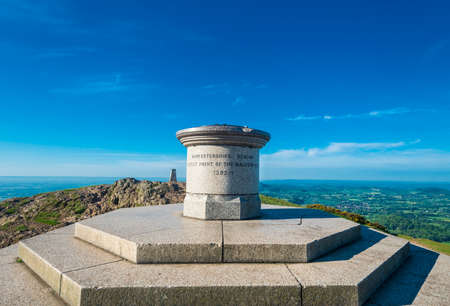 The highest point in Worcestershire.In sunny summer weather against blue sky,scenic panoramic 360 degree views of the Malverns,Gloustershire,Severn valley and Herefordshire.のeditorial素材