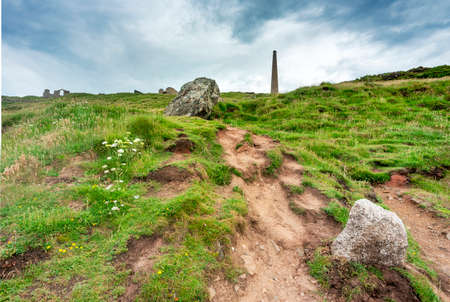 UNESCO World Heritage Site,part of a group of disused mines in the area,on a calm summer day.On the dramatic north Cornish coast,a popular holiday,tourist and clifftop walks destination.の写真素材