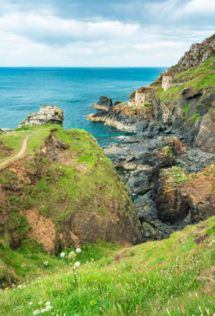 View from flower covered clifftop,UNESCO World Heritage site,on a calm summer day on the dramatic...