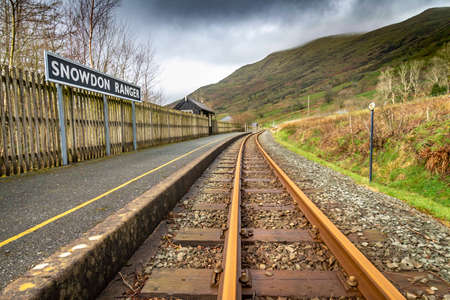 A pick up point on the Welsh Highland Railway,winding up to the summit of Mount Snowdon,through the north Wales countryside,a popular scenic route for tourists travellng up to the famous peak.の写真素材