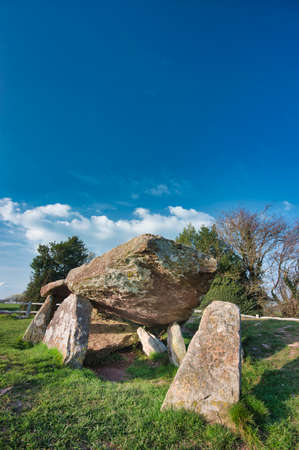 Large stones of the inner burial chamber,5000 years old.Close to Welsh border.Overlooking the Golden Valley, Herefordshire and the Wye Valley,linked to King Arthur.Sunny spring day,close to sunset.の写真素材