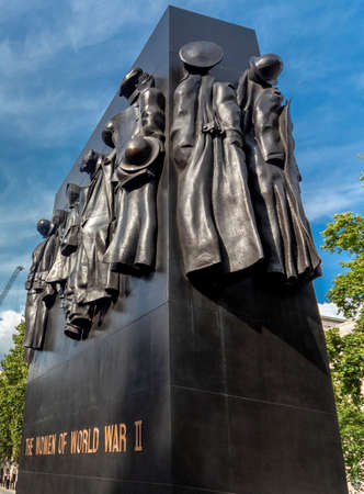 Central London,England,United Kingdom-August 21 2019: The Monument to the Women who served in World War II stands opposite Downing Street,next to the Cenotaph,unveiled by the Queen in 2005.のeditorial素材