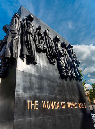 Central London,England,United Kingdom-August 21 2019: The Monument to the Women who served in World War II stands opposite Downing Street,next to the Cenotaph,unveiled by the Queen in 2005.のeditorial素材