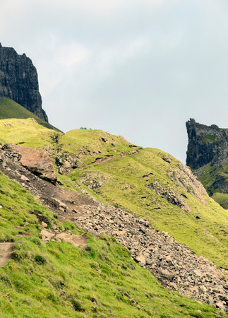 During the summer,featuring unique dramatic escarpments and a seven kilometer hiking loop,with jagged peaks and impressive views over Skye.の写真素材