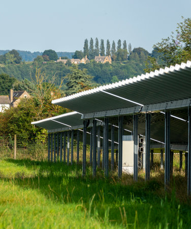 Side,detailed view of solar panels,working units,glowing with and reflecting late afternoon...
