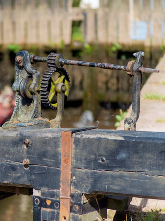 At Diglis Locks, on the River Severn, a closeup of the iron winding mechanics,on one of the canal...