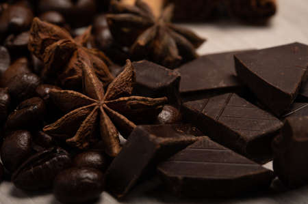 Star anise, coffee beans and dark chocolate up closeの写真素材