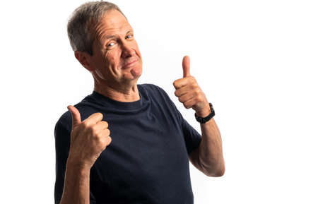 Portrait of a mature man smiling with a positive attitude isolated on a white background with copy...