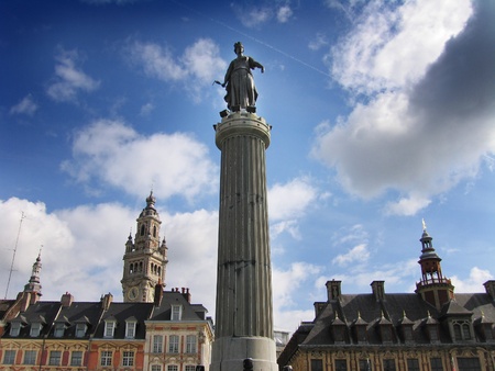 Statue of the French Revolution (built 1792) with the tower of the Chambre de Commerce in the distanceの写真素材