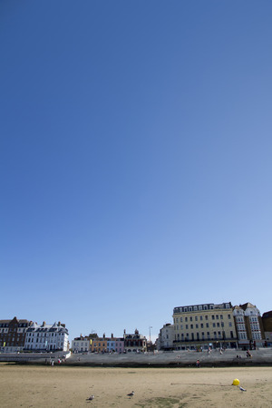 MARGATE, KENT, UK - AUGUST 8. 2015. English seaside town with old fashioned painted houses and shops located in the historic town of Margate, Kent, UK.のeditorial素材