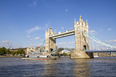 LONDON, UK - SEPTEMBER 1, 2018. View of Tower Bridge on the River Thames opening for passing boats. London, England, UK, September 1, 2018のeditorial素材