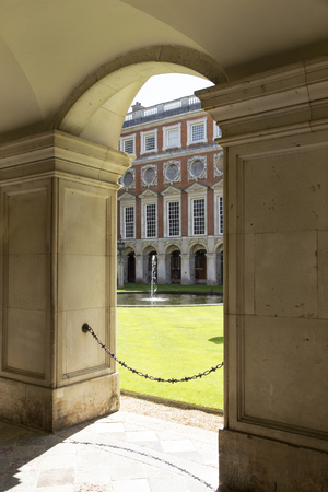 LONDON, UK - May 11, 2018. Courtyard at Hampton Court Palace which was originally built for Cardinal Thomas Wolsey 1515, later became King Henry VIII residence. London, Uk - May 11, 2018のeditorial素材