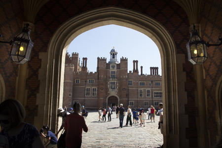 LONDON, UK - May 11, 2018. Entrance to Hampton Court Palace which was originally built for Cardinal Thomas Wolsey 1515, later became King Henry VIII residence. London, Uk - May 11, 2018のeditorial素材