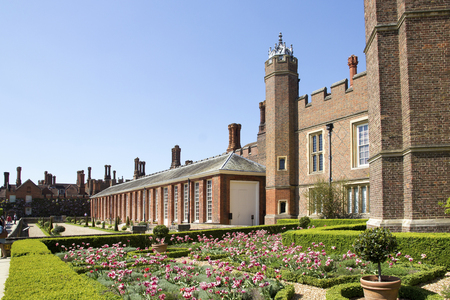 LONDON, UK - May 11, 2018. Courtyard at Hampton Court Palace which was originally built for Cardinal Thomas Wolsey 1515, later became King Henry VIII residence. London, Uk - May 11, 2018のeditorial素材