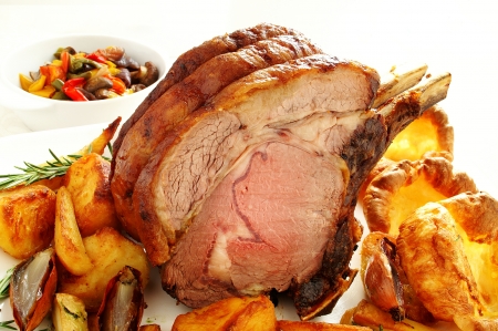 traditional roast rib of beef with vegetablesの写真素材