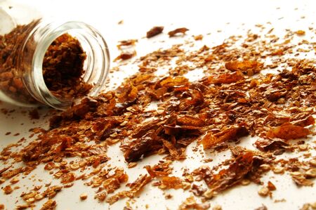 crushed dried chilies and glass jar