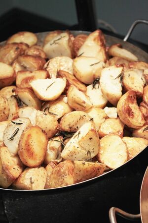 potatoes frying in pan