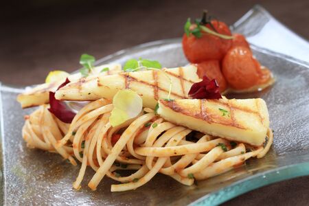 grilled houlumi with spaghetti plated mealの写真素材