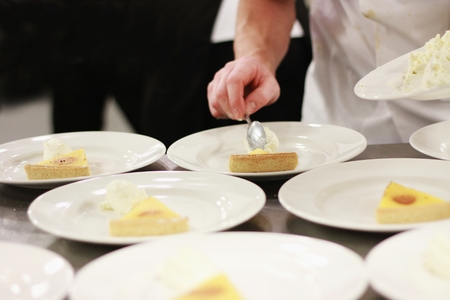 Preparing plated tarte au citron dessertの写真素材