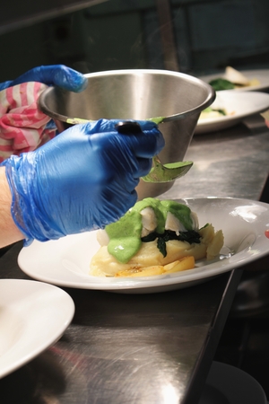 plated food in kitchenの写真素材
