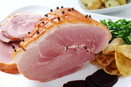plated pork dinner mealの写真素材