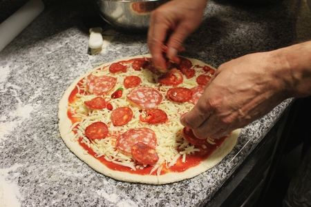 chef preparing pizzaの写真素材