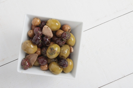 mixed olives antipasto in dishの写真素材