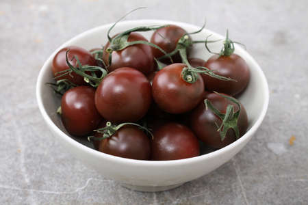 heritage black tomatoesの写真素材
