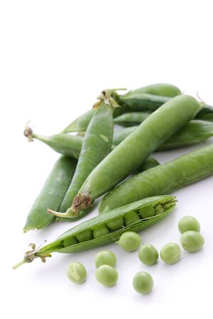 fresh garden peas in podの写真素材