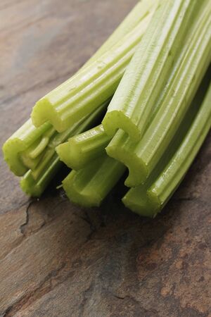fresh cellery sticks on slate backgroundの写真素材