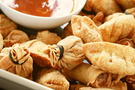 chinese dim sum with dipping sauce selectionの写真素材