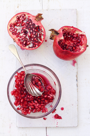 fresh pomegranate fruit with seedsの写真素材