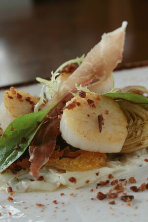 plated scallop appetizer meaの写真素材
