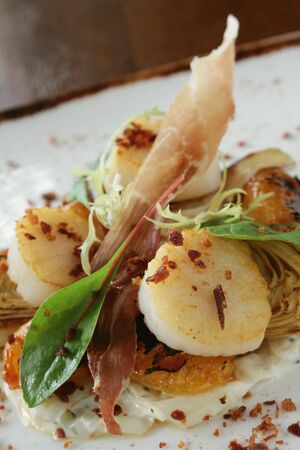 plated scallop appetizer meaの写真素材