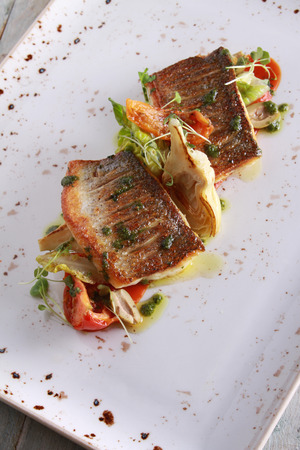 healthy seabass fish plated meatの写真素材