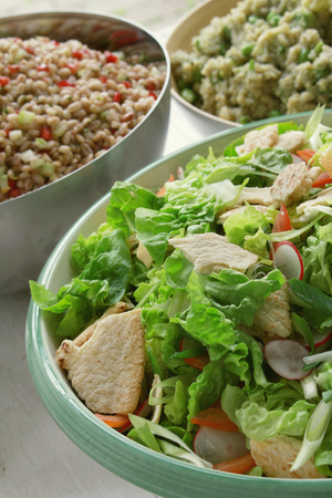 mixed green salad in bowlの写真素材