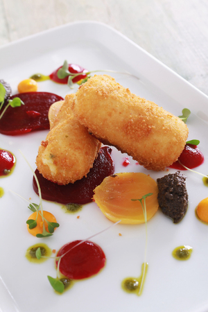 potato croquette with beetroos appetizer starterの写真素材