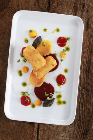 potato croquette with beetroos appetizer starterの写真素材