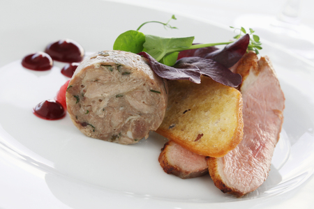 duck and pork appetizer starter plated meal foodの写真素材