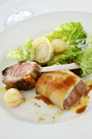 gourmet cuisine plated lamb selection dinner mealの写真素材