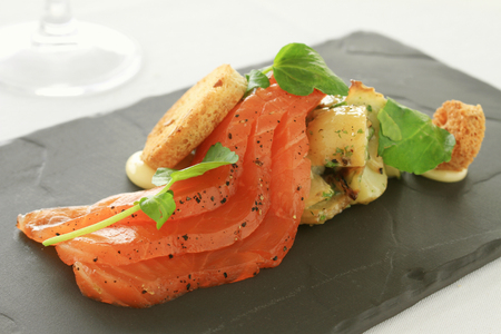 healthy smoked cured salmon appetizer starter mealの写真素材