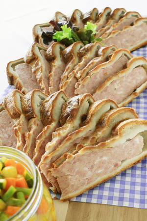 traditional sliced british pork pie buffet platterの写真素材