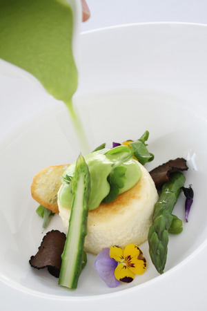 baked seasonal  asparagus cheese souffle starter appetizerの写真素材