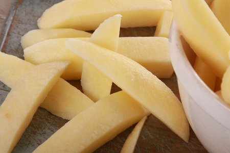 preparing chipped potatoesの写真素材