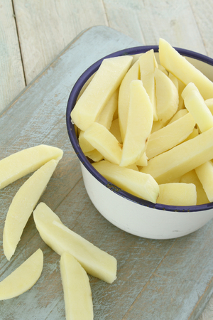 preparing chipped potatoesの写真素材